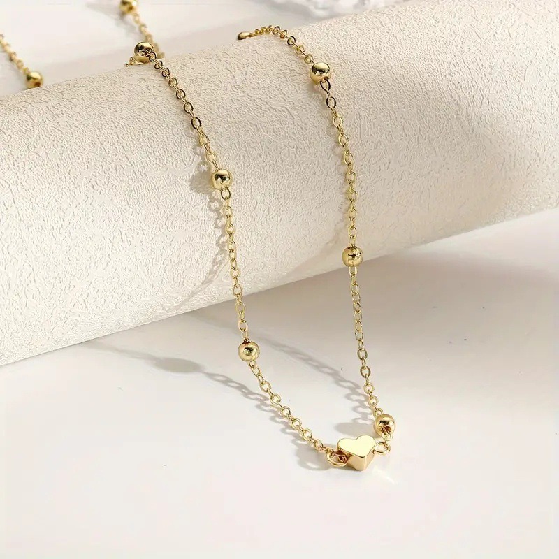 繊細なゴールドのハート型ウエストチェーン、ビーズ付きのボディ - Body Jewelry For You のレビューと価格